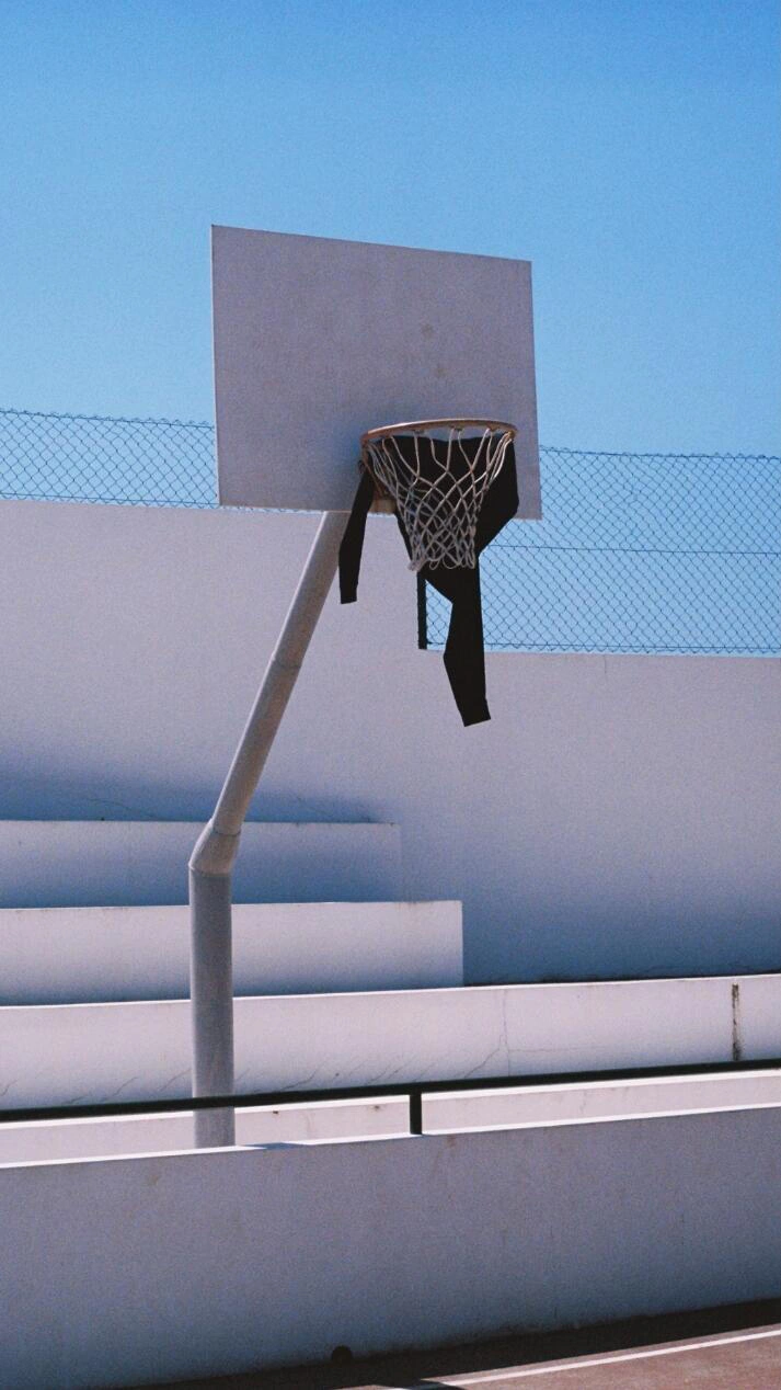 Sweatshirt in a basketball hoop